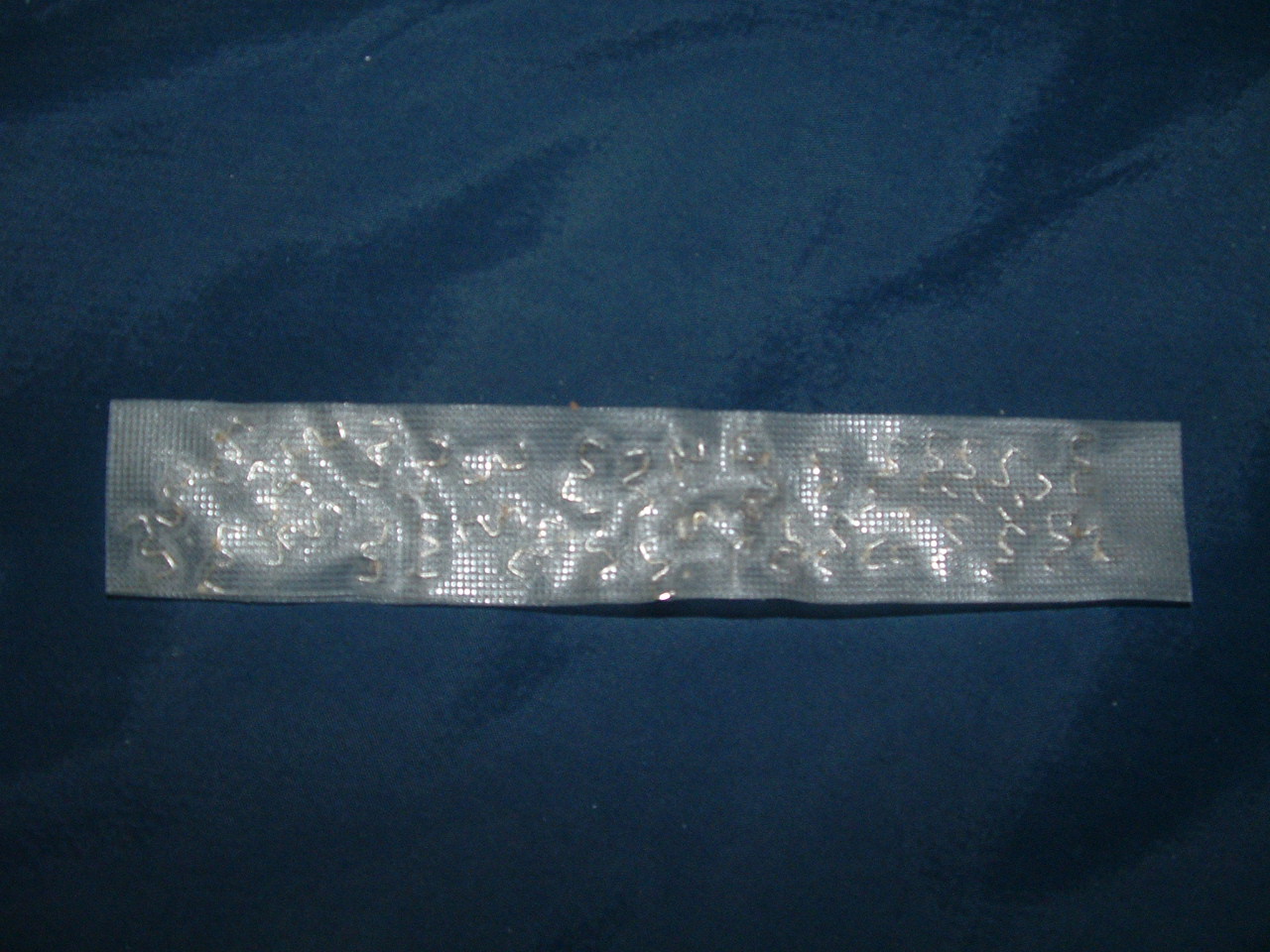 Eventually I got them out though, I still have this piece of tape containing them, it looks like this